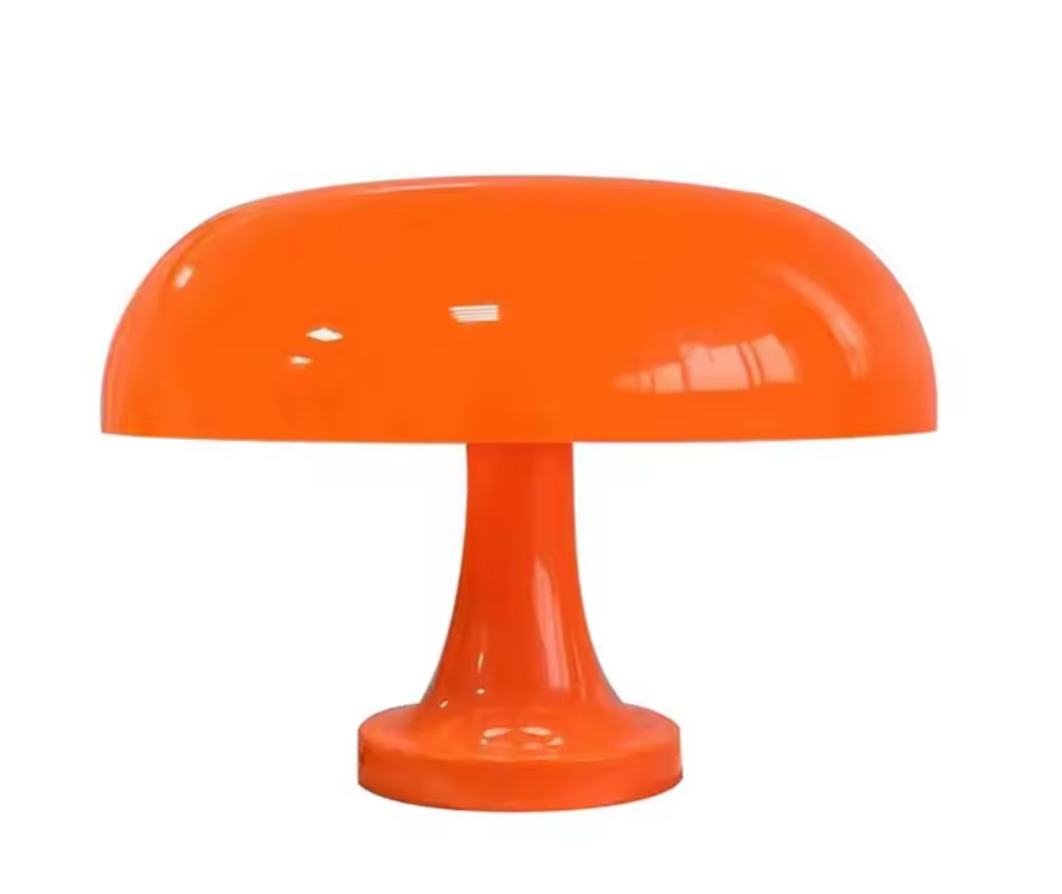 Orange table lamp with a white background